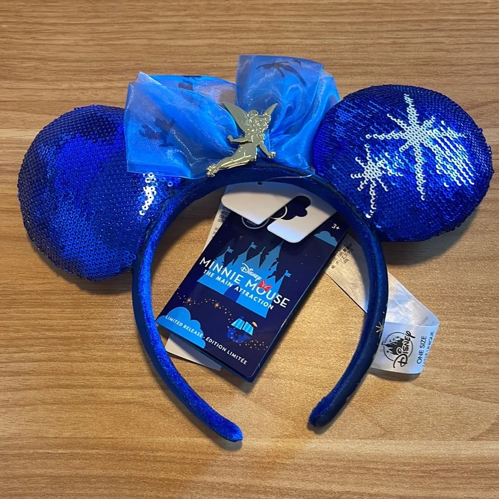 ๐ง๐ปโโ๏ธ PETER PAN DISNEY MINNIE MOUSE EAR HEADBAND - Picture 1 of 2